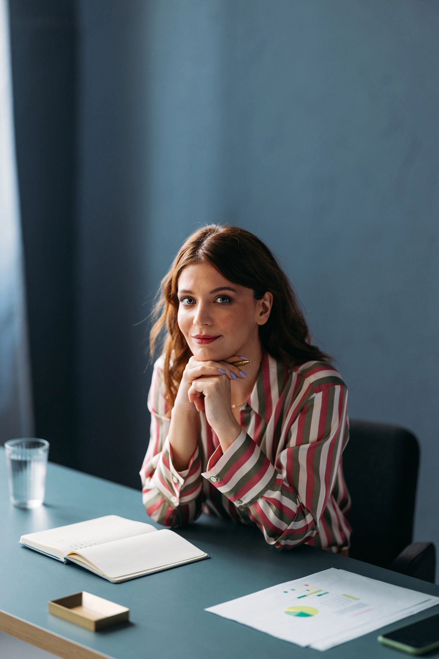 Professional author portrait at writing desk