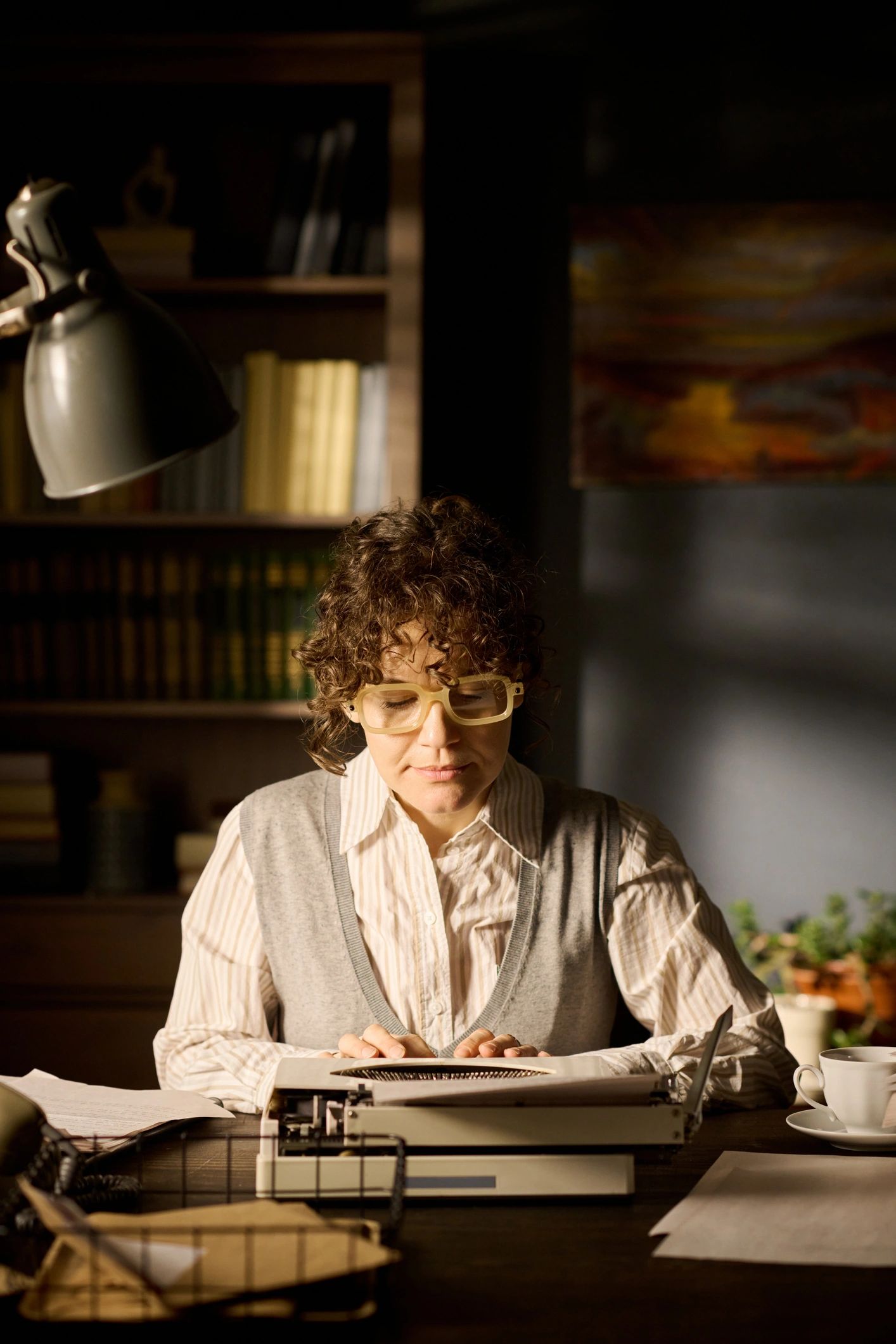 Author-style portrait at a writing desk